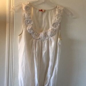 White Sleeveless Top with Floral Neckline